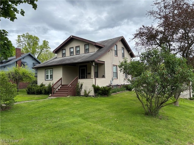 806 N Market St, East Palestine, OH 44413 - view of front of house featuring a front yard and covered porch