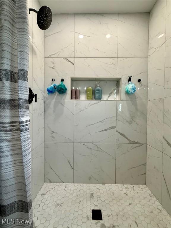 bathroom with a stall shower
