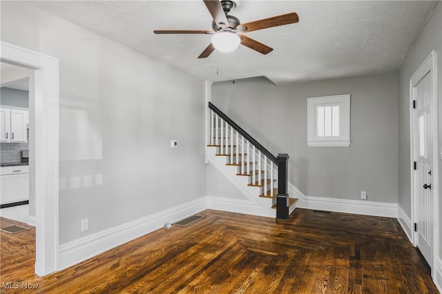 406 39th St, Vienna, WV 26105 - entryway featuring a ceiling fan, stairway, baseboards, and a textured ceiling