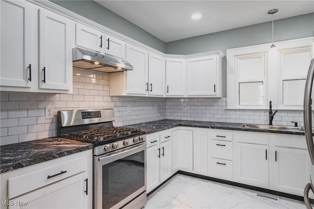 406 39th St, Vienna, WV 26105 - kitchen with gas range, under cabinet range hood, a sink, light marble finish floors, and white cabinets