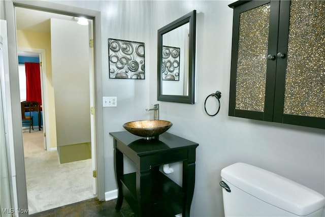 9960 Ridge Rdg, Farmdale, OH 44417 - bathroom with vanity, toilet, and baseboards