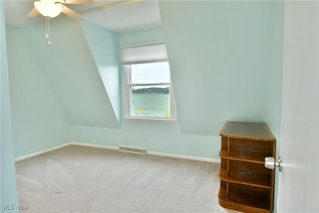 9960 Ridge Rdg, Farmdale, OH 44417 - unfurnished bedroom featuring baseboards, carpet floors, and a ceiling fan