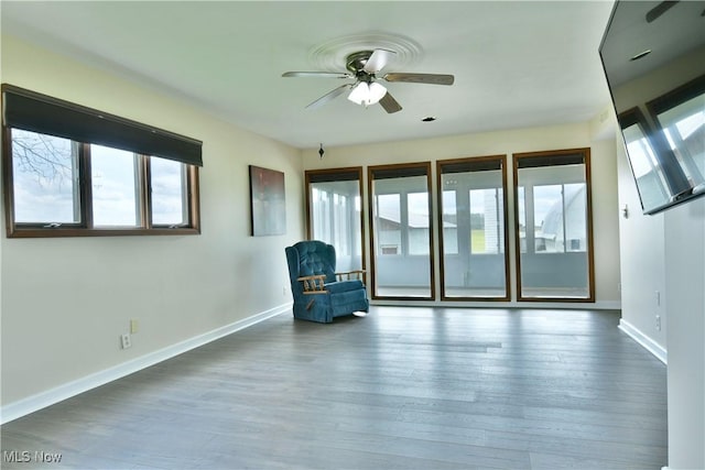 9960 Ridge Rdg, Farmdale, OH 44417 - unfurnished room with ceiling fan, baseboards, and wood finished floors