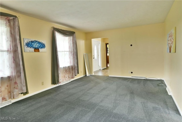 9960 Ridge Rdg, Farmdale, OH 44417 - unfurnished room with carpet and baseboards