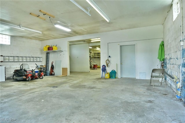 9960 Ridge Rdg, Farmdale, OH 44417 - garage featuring concrete block wall