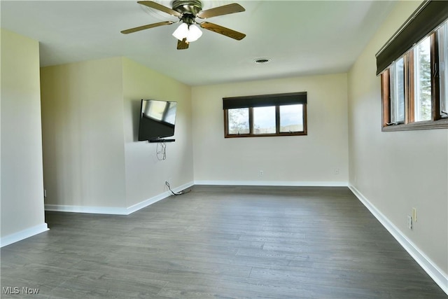 9960 Ridge Rdg, Farmdale, OH 44417 - unfurnished room with dark wood-style floors, baseboards, and a ceiling fan