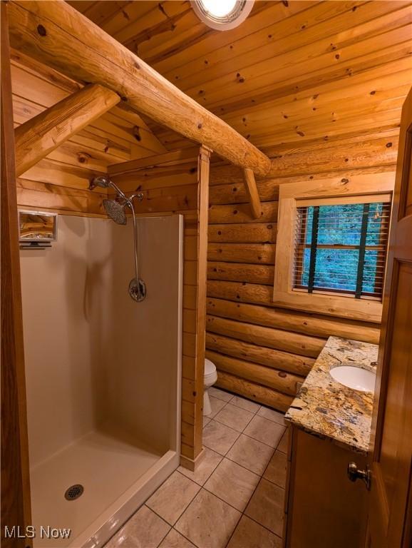5216 Arrow Rd NW, Minerva, OH 44657 - full bath featuring log walls, wood ceiling, a shower stall, vanity, and tile patterned floors
