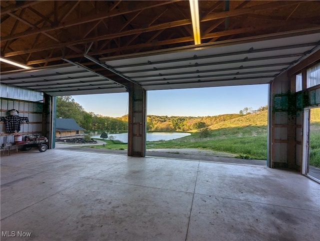 5216 Arrow Rd NW, Minerva, OH 44657 - garage featuring a water view