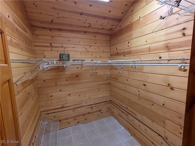 5216 Arrow Rd NW, Minerva, OH 44657 - relaxing sauna / steam room featuring tile patterned flooring, wood walls, and wooden ceiling