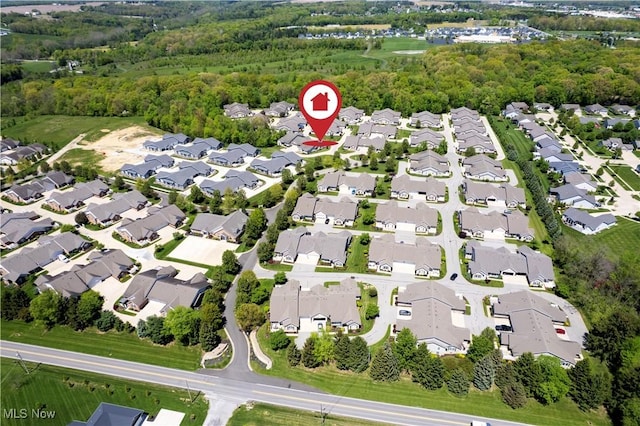 2618 Weatherington Ln Unit 264, Wooster, OH 44691 - aerial overview of property's location with nearby suburban area and a forest