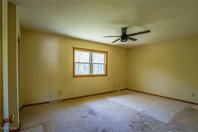 265 Franklin Dr, Doylestown, OH 44230 - carpeted spare room featuring a ceiling fan and baseboards