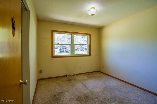 265 Franklin Dr, Doylestown, OH 44230 - carpeted spare room featuring baseboards