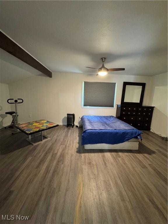 5897 Kimberly Dr, Bedford Heights, OH 44146 - bedroom featuring wood finished floors, a ceiling fan, and beam ceiling