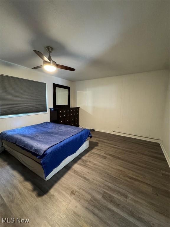 5897 Kimberly Dr, Bedford Heights, OH 44146 - bedroom featuring wood finished floors and ceiling fan