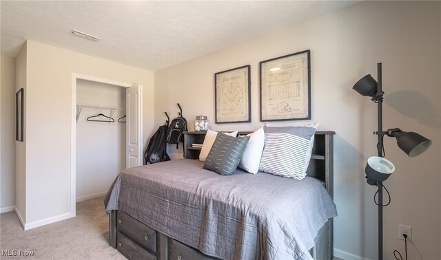 420 Honeycrisp Dr NE, Louisville, OH 44641 - bedroom featuring carpet, baseboards, and a closet