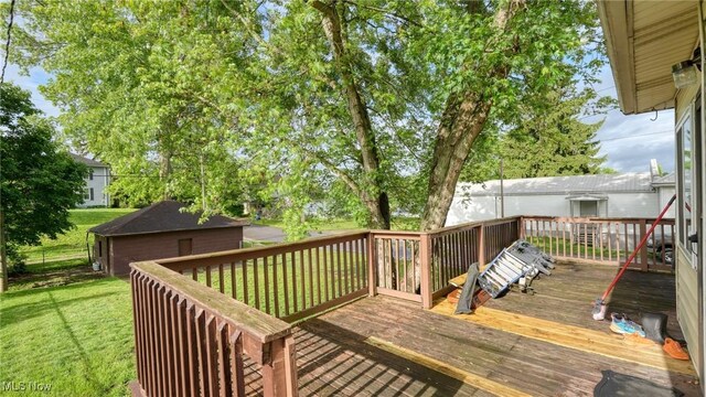 1200 Blaine Ave, Cambridge, OH 43725 - deck with a lawn and an outbuilding