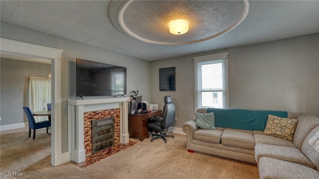 1200 Blaine Ave, Cambridge, OH 43725 - office with light colored carpet, a textured ceiling, baseboards, and a fireplace with flush hearth