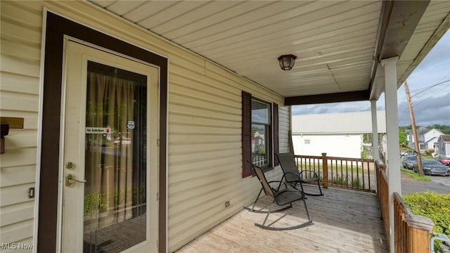 1200 Blaine Ave, Cambridge, OH 43725 - deck featuring a porch