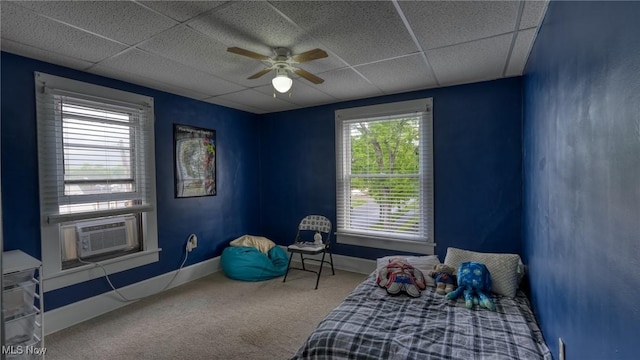 1200 Blaine Ave, Cambridge, OH 43725 - bedroom featuring a drop ceiling, carpet, baseboards, a ceiling fan, and cooling unit