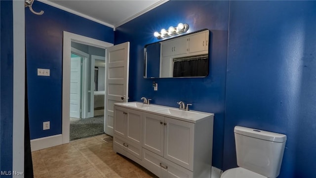 1200 Blaine Ave, Cambridge, OH 43725 - bathroom featuring crown molding, toilet, baseboards, and double vanity