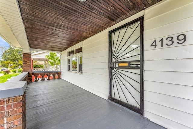 deck with covered porch