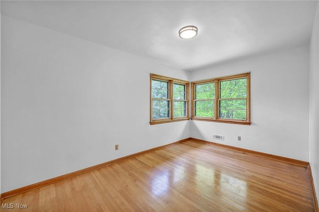 4422 Forest Hills Blvd, Parma, OH 44134 - unfurnished room with wood finished floors and baseboards