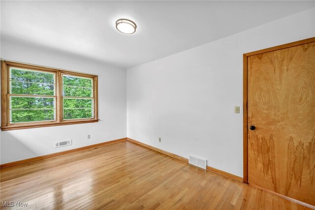 4422 Forest Hills Blvd, Parma, OH 44134 - empty room with light wood-type flooring and baseboards