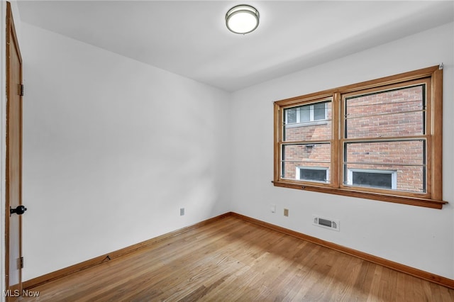 4422 Forest Hills Blvd, Parma, OH 44134 - unfurnished room featuring baseboards and light wood-style floors