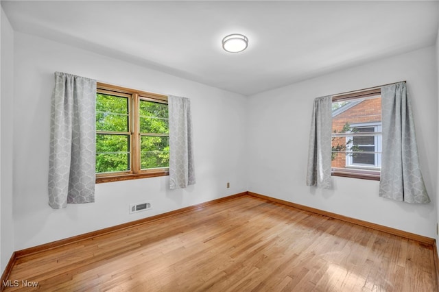 4422 Forest Hills Blvd, Parma, OH 44134 - spare room featuring light wood-style floors and baseboards