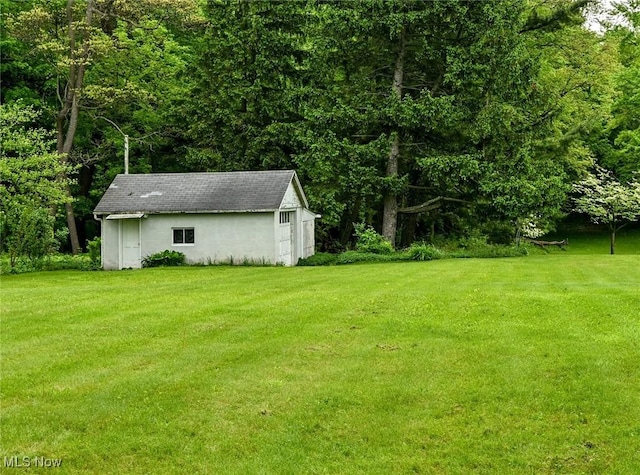1883 Massillon Rd, Akron, OH 44312 - view of grassy yard with an outdoor structure