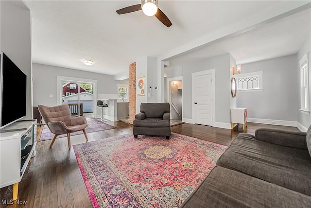 1303 W 115th St, Cleveland, OH 44102 - living room featuring dark wood finished floors, ceiling fan, and baseboards
