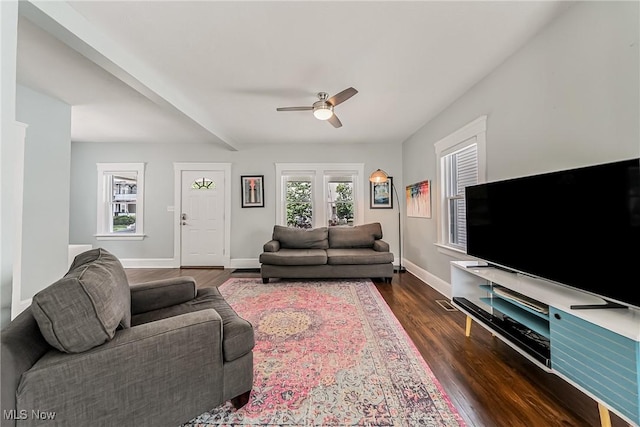 1303 W 115th St, Cleveland, OH 44102 - living room featuring ceiling fan, dark wood-style floors, and baseboards
