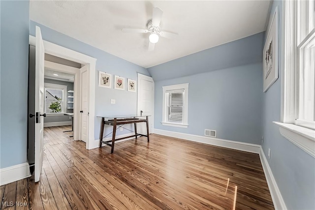 1303 W 115th St, Cleveland, OH 44102 - bedroom featuring dark wood finished floors, baseboards, and ceiling fan