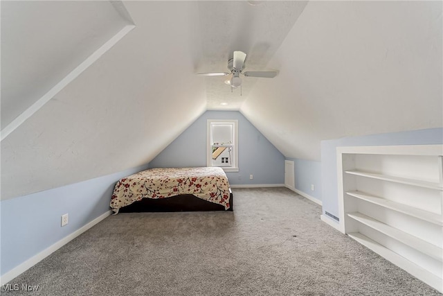 1303 W 115th St, Cleveland, OH 44102 - carpeted bedroom with lofted ceiling, ceiling fan, and baseboards