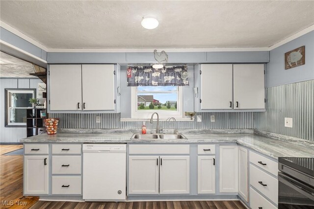 1439 Township Road 593, Ashland, OH 44805 - kitchen with white dishwasher, a sink, white cabinetry, crown molding, and dark wood-style flooring