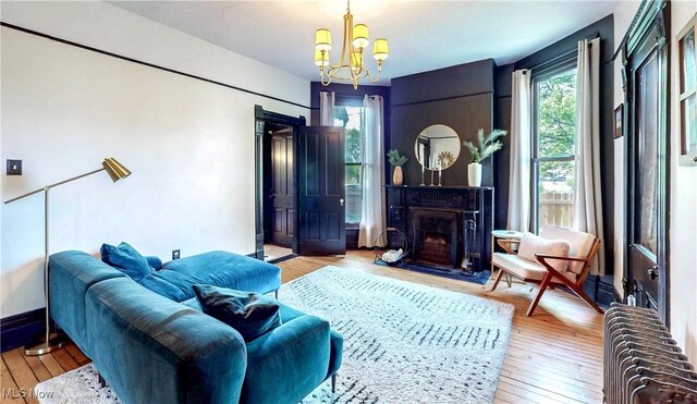 2963 Scranton Rd, Cleveland, OH 44113 - living area with plenty of natural light, a chandelier, and light wood finished floors