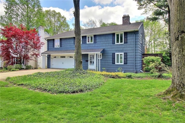 23770 Duffield Rd, Shaker Heights, OH 44122 - view of front of property with a chimney, concrete driveway, an attached garage, and a front lawn