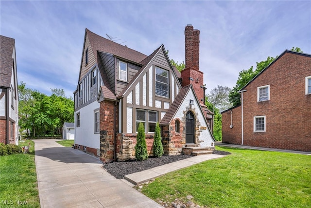 17617 Lomond Blvd, Shaker Heights, OH 44120 - tudor home with a front yard