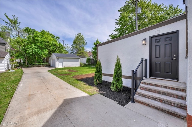 17617 Lomond Blvd, Shaker Heights, OH 44120 - doorway to property with stucco siding and a yard