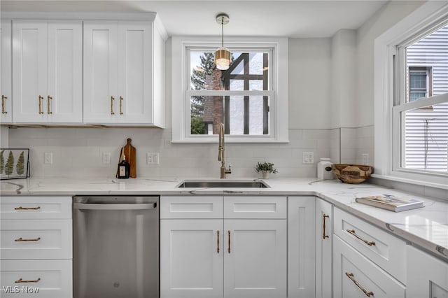 17617 Lomond Blvd, Shaker Heights, OH 44120 - kitchen with dishwasher, a sink, white cabinets, and backsplash