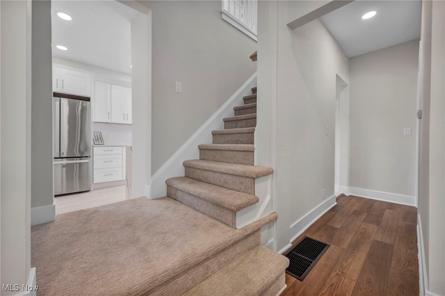 17617 Lomond Blvd, Shaker Heights, OH 44120 - stairway with baseboards, recessed lighting, and wood finished floors