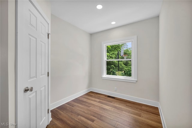 17617 Lomond Blvd, Shaker Heights, OH 44120 - unfurnished room featuring baseboards, dark wood-style flooring, and recessed lighting