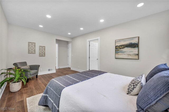 17617 Lomond Blvd, Shaker Heights, OH 44120 - bedroom with wood finished floors, recessed lighting, and baseboards