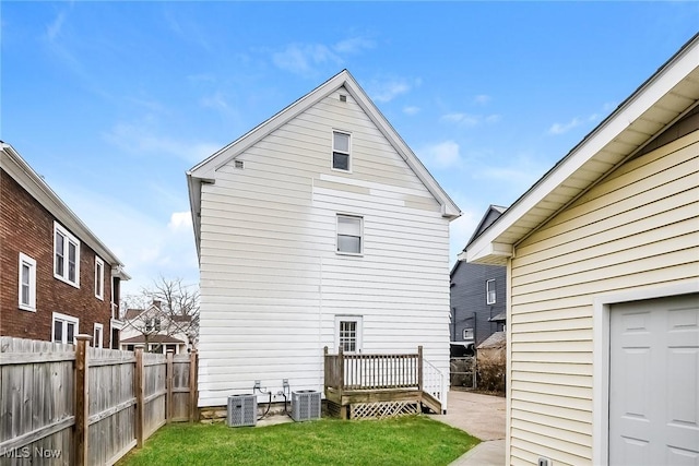 1636 Hopkins Ave, Lakewood, OH 44107 - rear view of house with central AC unit and a wooden deck