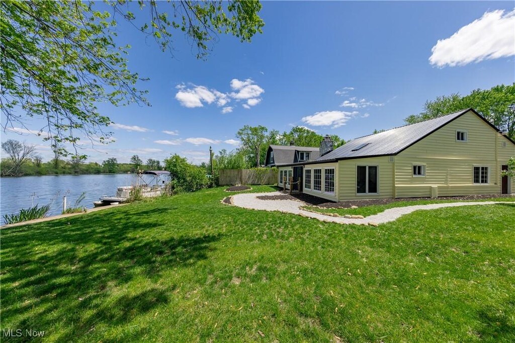 665 Cove Blvd, Akron, OH 44319 - view of yard featuring a water view, french doors, and a dock