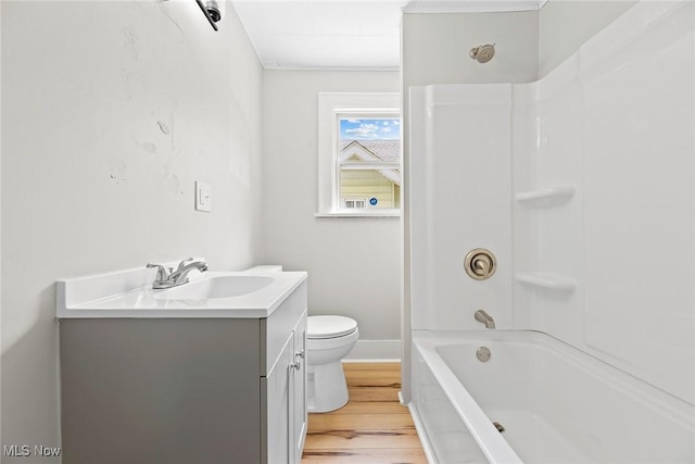 1254 Delos St, Akron, OH 44306 - bathroom featuring toilet, wood finished floors, vanity, baseboards, and shower / bath combination