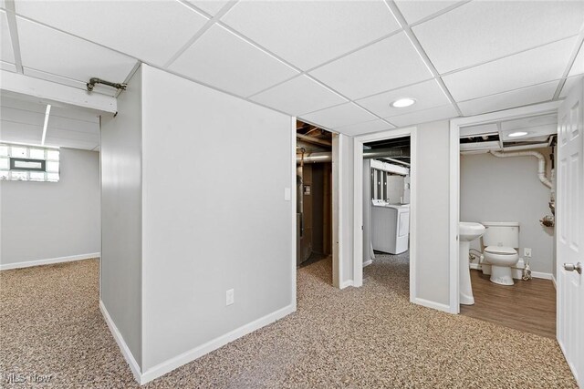 1254 Delos St, Akron, OH 44306 - basement with carpet flooring, baseboards, a drop ceiling, recessed lighting, and washer / clothes dryer