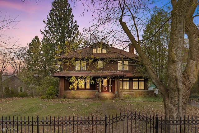 245 Merriman Rd, Akron, OH 44303 - view of front of home with a chimney and a gate
