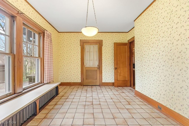 245 Merriman Rd, Akron, OH 44303 - empty room with wallpapered walls, crown molding, and baseboards
