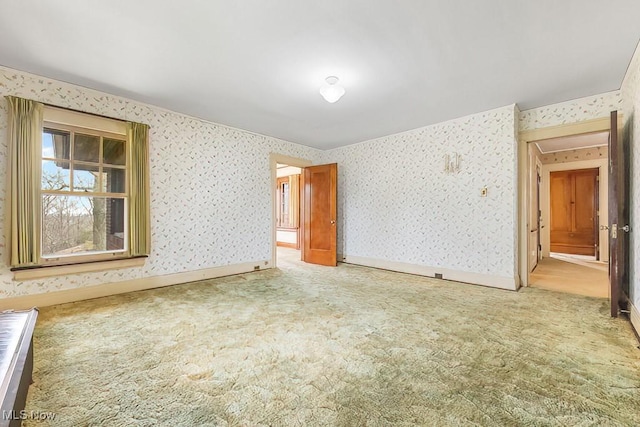 245 Merriman Rd, Akron, OH 44303 - empty room featuring light carpet, wallpapered walls, and baseboards